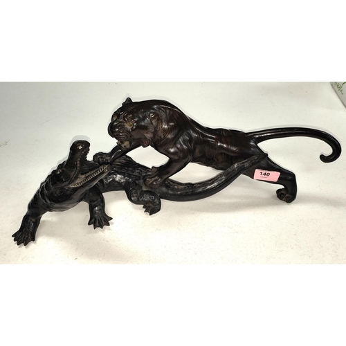 140 - A 19th century Chinese/Japanese bronze group:  tiger attacking a crocodile, rectangular seal mark to... 