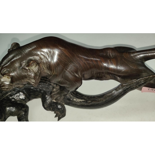 140 - A 19th century Chinese/Japanese bronze group:  tiger attacking a crocodile, rectangular seal mark to... 