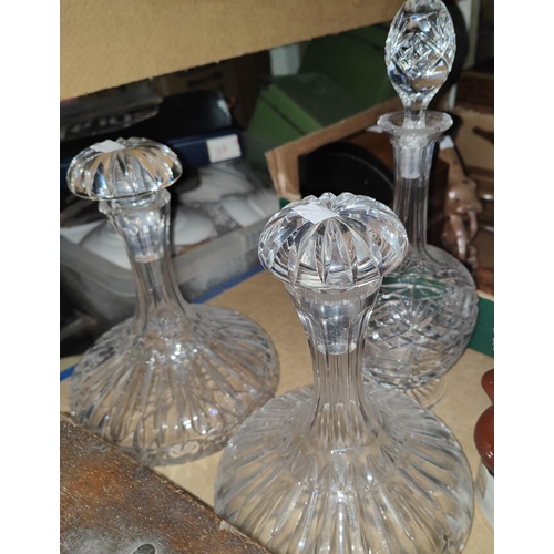 142 - A tinplate bar tender, two sad dog musical decanters and 3 cut glass decanters