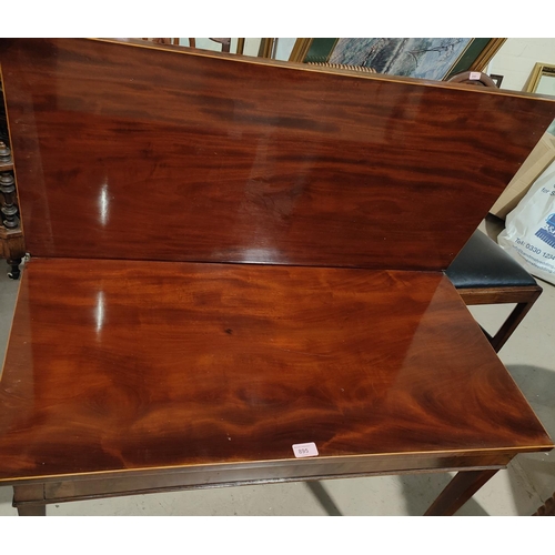 895 - A 19th century Sheraton style mahogany side table, the rectangular fold-over top with boxwood line i... 