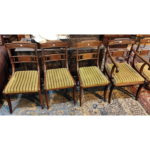 896 - A set of 7 (6 + 1) Regency mahogany dining chairs with rope work backs and side columns, on sabre le... 