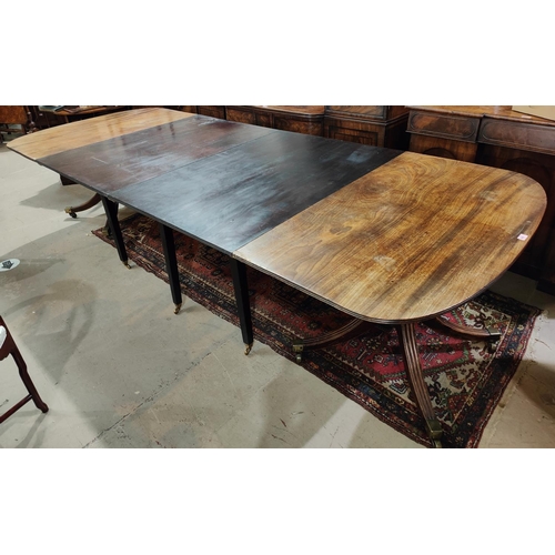 905 - A 19th century Georgian style mahogany dining table, with extending 'D' ends, twin pedestals with tu... 