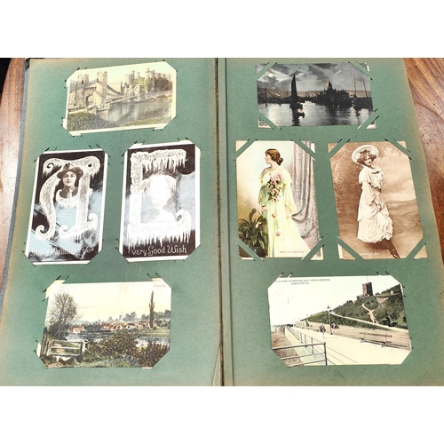 15A - An Art Nouveau album of post cards Edwardian and later