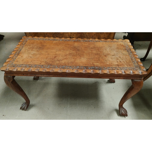 900 - An oriental carved hardwood coffee table with rectangular top