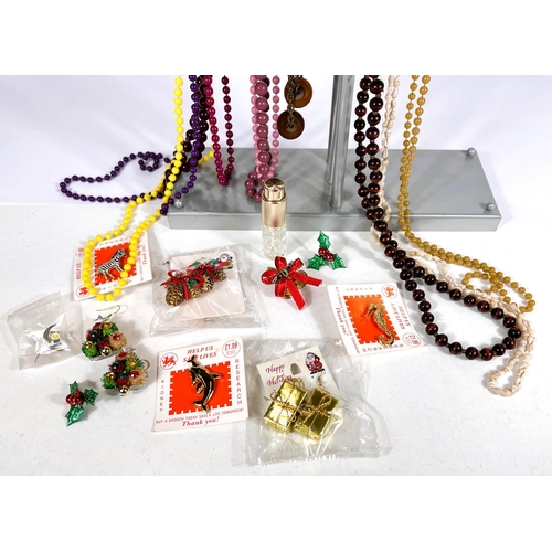 683 - A large selection of modern costume jewellery to include bead necklaces, shell necklace, bracelets a... 