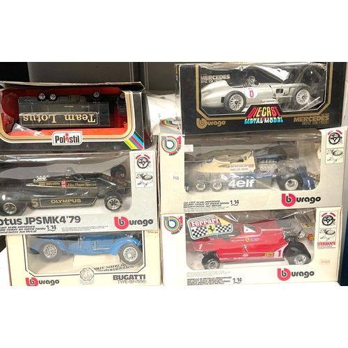 310 - A collection of boxed diecast vehicles, 1/24 scale and other smaller, Majorette, Porsche, Jet Age Mi... 