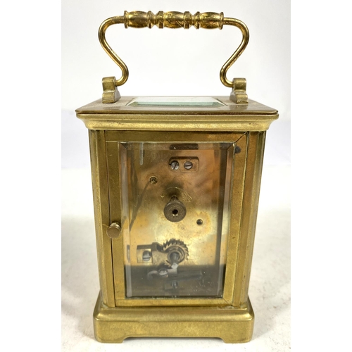 134 - A 19th century French carriage clock with white dial and timepiece movement