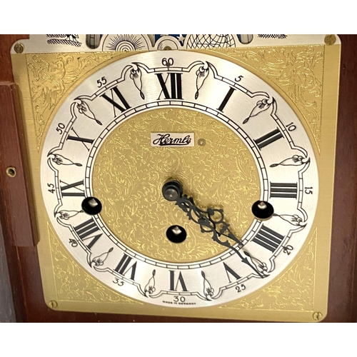 14 - A reproduction Georgian style bracket clock in mahogany arch top case, with silvered and brass dial,... 