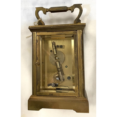 15 - A late 19th/early 20th century brass carriage clock with timepiece movement by Dent, Pall Mall, Lond... 
