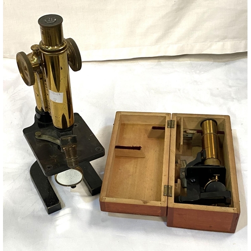 17 - A microscope with 2 lenses by Watson & Son; a small travel microscope in wooden case