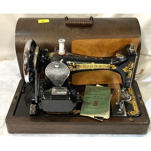 19 - A cased Singer sewing machine