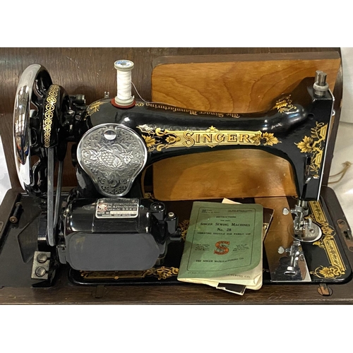 19 - A cased Singer sewing machine