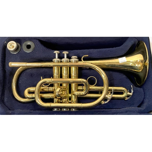 22 - A John Packer gilt trumpet in carry case