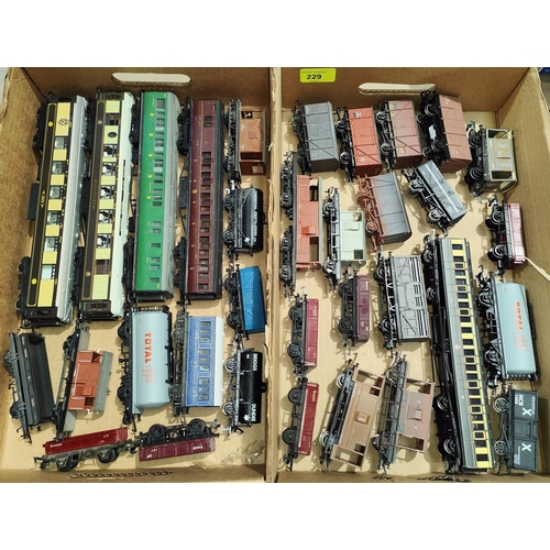 229 - Thirty three various carriages; tankers; trucks; etc., 00 gauge