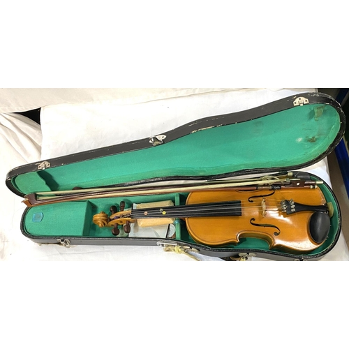 23 - A 20th century Lark students violin with two piece back, carry case and two bows