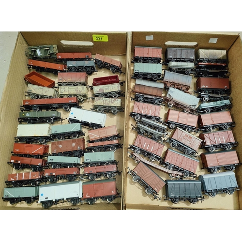 231 - Over 55 various carriages; tankers; trucks; etc., 00 gauge