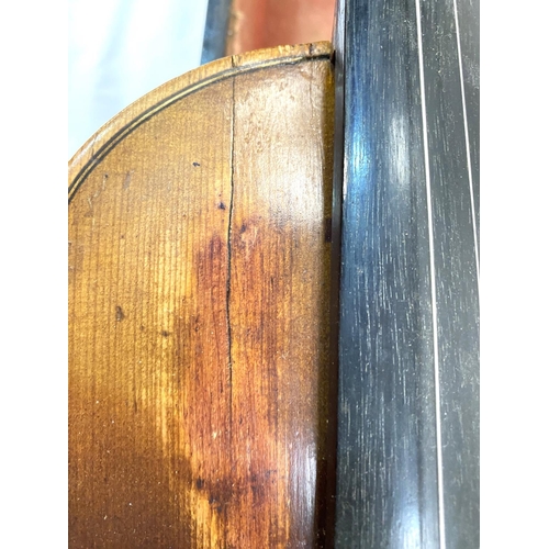 25 - A late 19th/ early 20th century two piece back violin in hard case (splits to body)