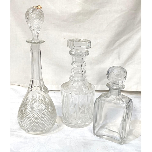 31 - A cut glass mallet shaped decanter, and 2 others, 28cm