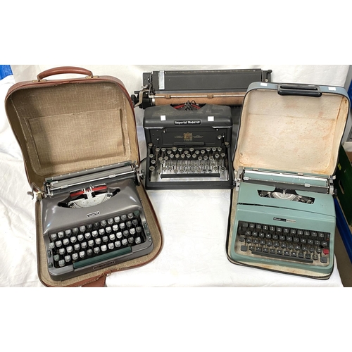 35 - An Imperial model 60 typewriter and two cased travel typewriters