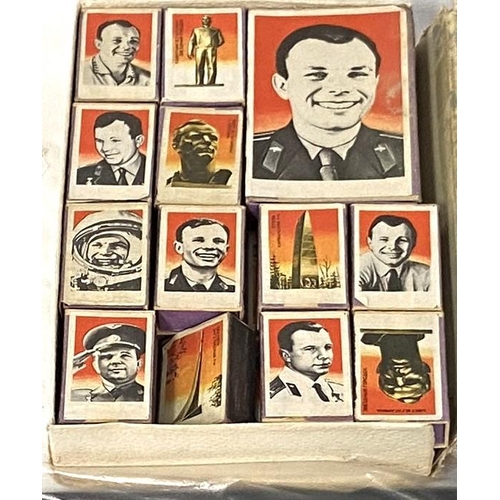 36 - A collection of Russian cosmonaut match boxes in another box and a collection of Chinese stamps etc