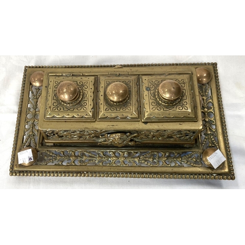 39 - A reproduction brass meteorological clock with three faces and a brass 19th century inkwell with cen... 
