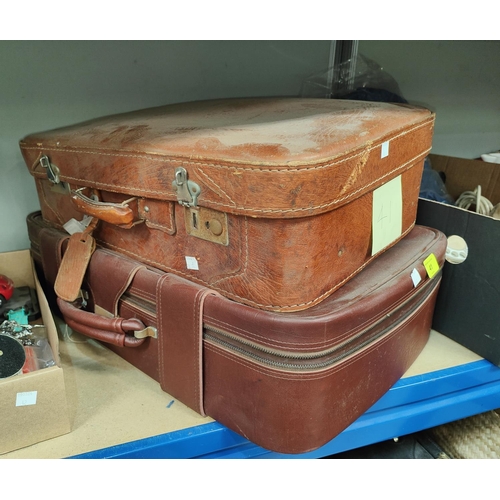 41 - A collection of vintage suitcases, bags etc