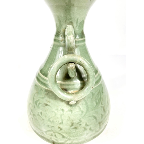 492 - A Chinese celadon glazed vase with Kyin dragon and ring handles, 22cm