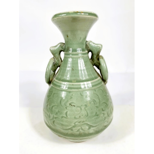 492 - A Chinese celadon glazed vase with Kyin dragon and ring handles, 22cm