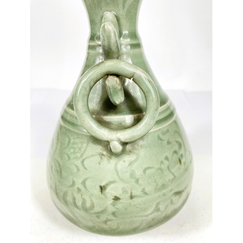 492 - A Chinese celadon glazed vase with Kyin dragon and ring handles, 22cm