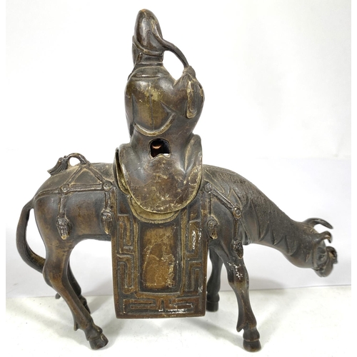 496B - A Chinese bronze censor in the form of a man on horseback (man's legs missing), length 17cm