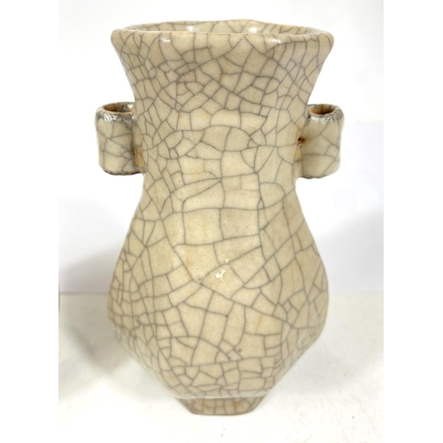 496C - A Chinese crackle glazed octagonal vase with two hoop handles on the outside, ht. 15cm and a similar... 