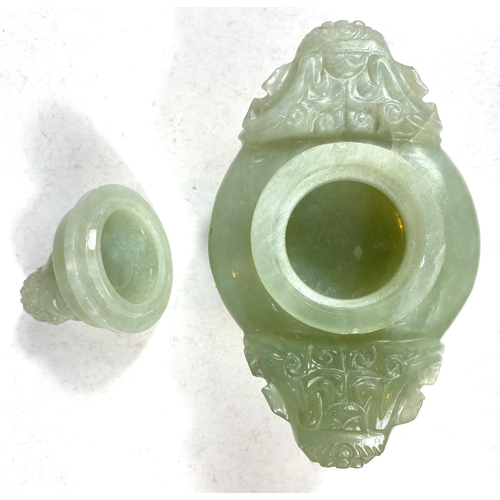 497A - A Chinese jade coloured hardstone censor with hoop handles, mythical beast carved finial and side mo... 