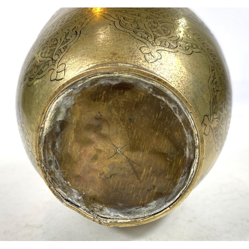 497B - An Islamic brass vase with etched decoration to the outside, tapering and flaring rim, ht. 14.5cm