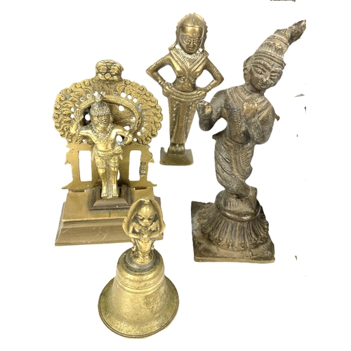 498A - A good selection of various Indian brassware including deities, lamps etc