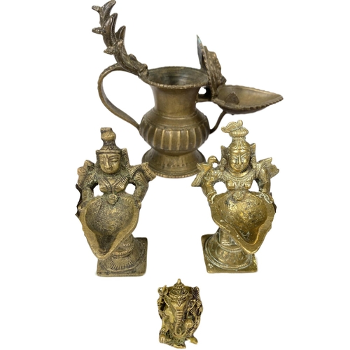 498A - A good selection of various Indian brassware including deities, lamps etc