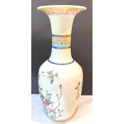 506A - A Chinese famille rose vase with decoration of birds on branches etc, height 21cm (rim well restored... 