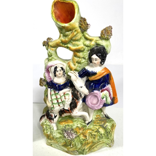 560 - A 19th century Staffordshire figure:  Little Red Riding Hood, eight 26cm (a.f.); a 19th ce... 