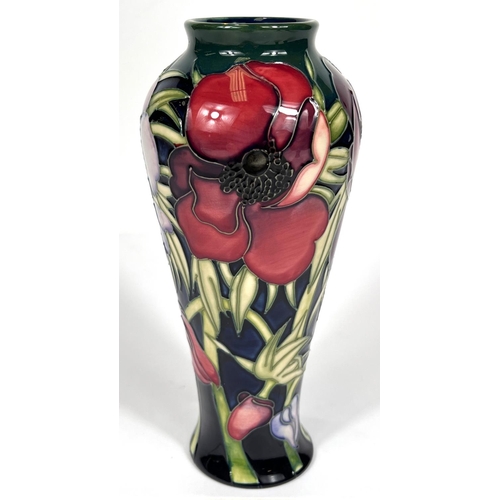 571E - Moorcroft: A pair of Moorcroft anemone vases, graduating blue to green ground, ht. 20cm