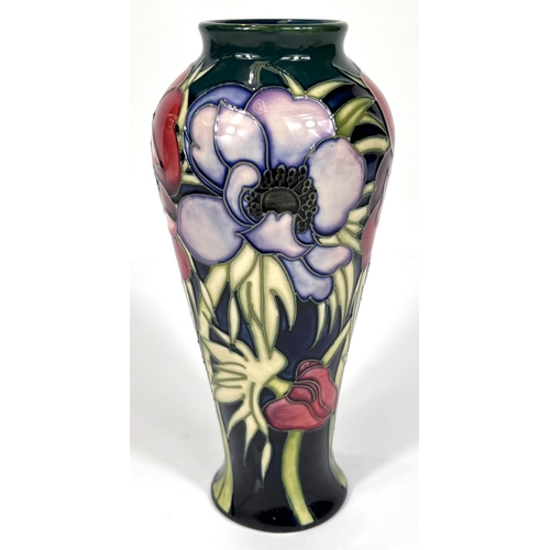 571E - Moorcroft: A pair of Moorcroft anemone vases, graduating blue to green ground, ht. 20cm