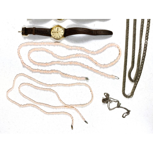 611 - A coral coloured necklace; 2 gent's vintage watches; other similar items