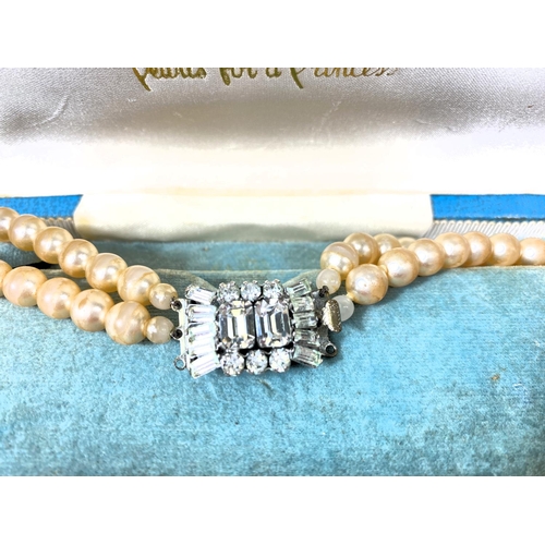 618 - A collection of Majorica pearl necklaces and bracelets, some with boxes, other simulated and other p... 