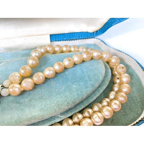 618 - A collection of Majorica pearl necklaces and bracelets, some with boxes, other simulated and other p... 