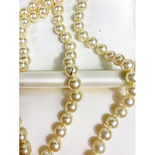 618 - A collection of Majorica pearl necklaces and bracelets, some with boxes, other simulated and other p... 