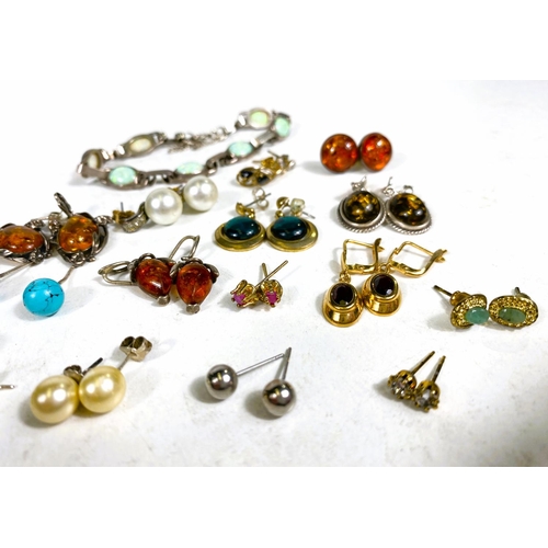 619 - A hallmarked silver and opal bracelet; a collection of earrings including Art Nouveau, amber, sapphi... 