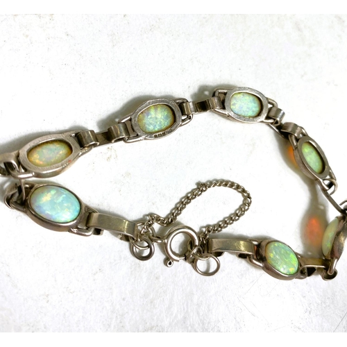 619 - A hallmarked silver and opal bracelet; a collection of earrings including Art Nouveau, amber, sapphi... 