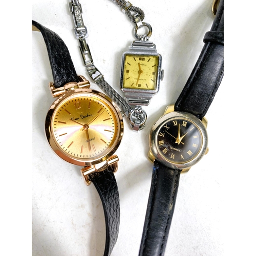 621 - A cased His and Hers Raymond Weil gold plated rectangular dial watches on black leather straps, smal... 