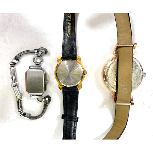 621 - A cased His and Hers Raymond Weil gold plated rectangular dial watches on black leather straps, smal... 