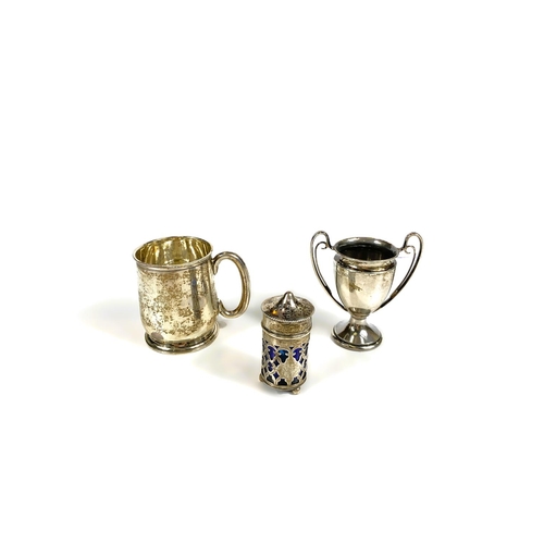 631 - Four hallmarked silver items:  a 2-handled trophy cup; a christening mug; a small trophy cup; a... 