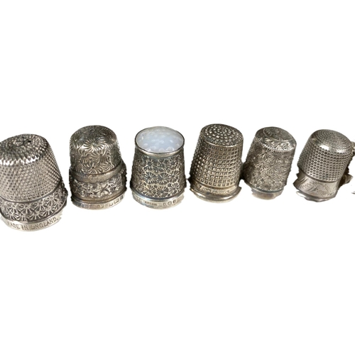 638 - Four hallmarked silver thimbles by Charles Horner; 11 hallmarked silver thimbles; other pl... 