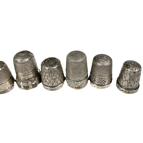 638 - Four hallmarked silver thimbles by Charles Horner; 11 hallmarked silver thimbles; other pl... 